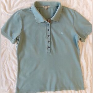 This is a Burberry women's polo shirt in a mint green color.